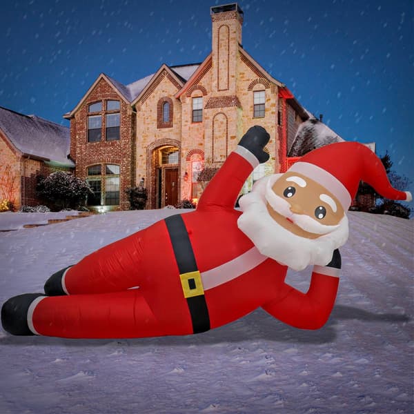 National Tree 6ft. Inflatable Lying Santa w/ White LED Lights