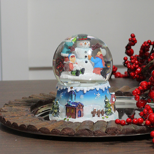 Open Video Modal for Northlight Seasonal Snowman and Children Musical Snow Globe