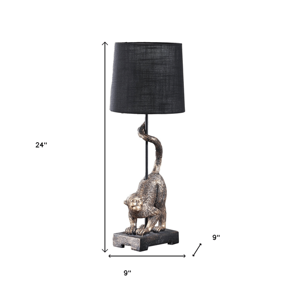 HomeRoots 24in. Antiqued Gold Monkey Table Lamp with Drum Shade