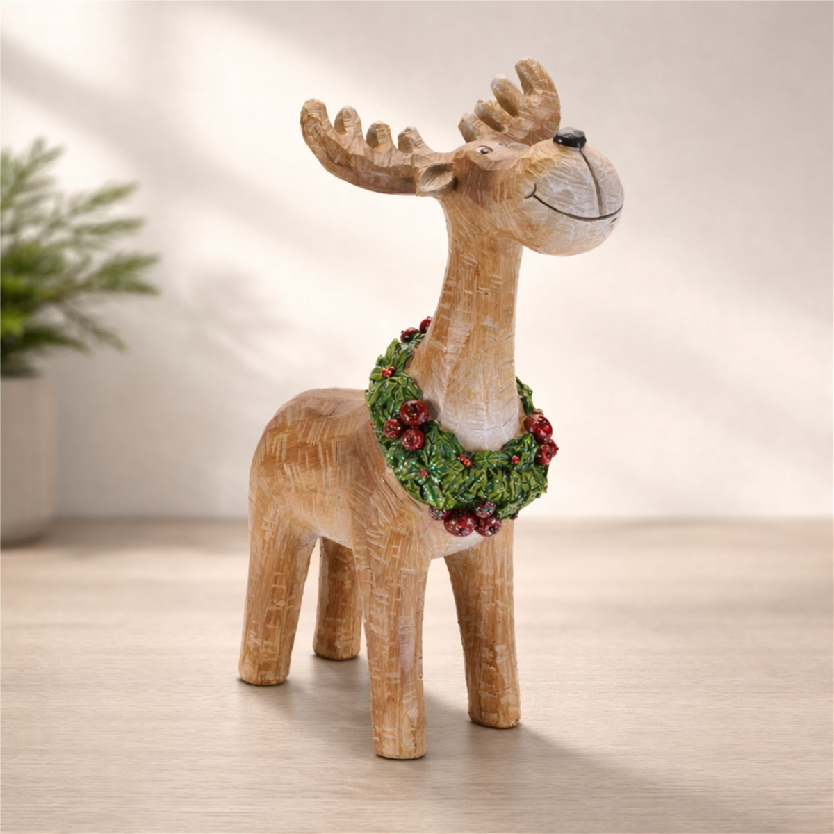 Melrose 11.5in. Whimsical Reindeer Figurine with Wreath