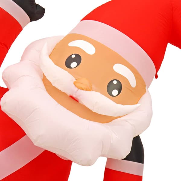 National Tree 6ft. Inflatable Lying Santa w/ White LED Lights