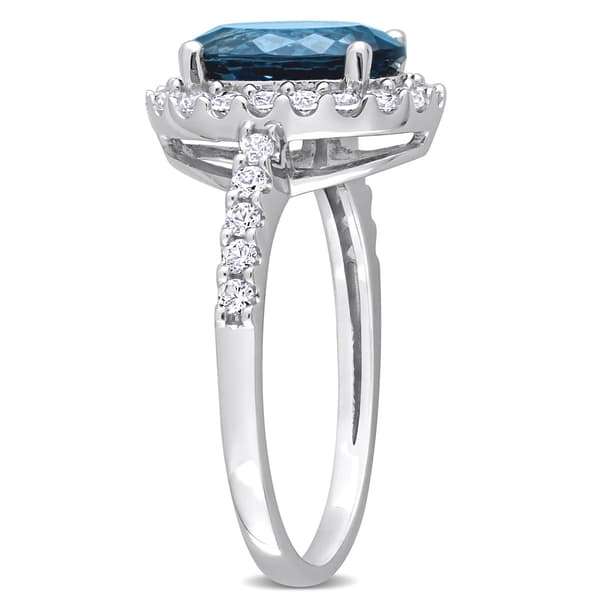 Gemstones Classics&#8482; 10kt. White Gold Oval Blue Topaz Halo Ring