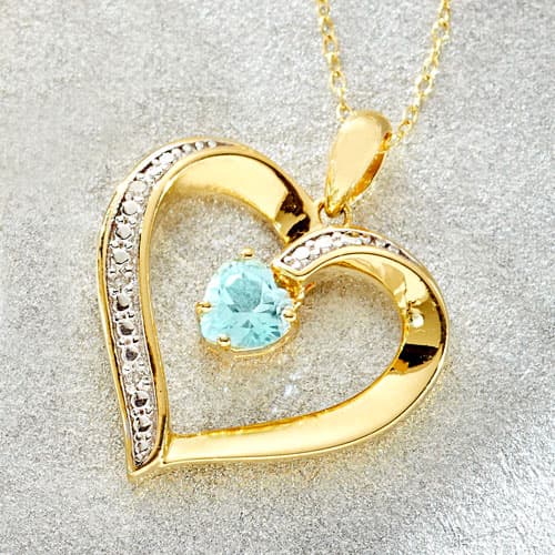 Gemstone Classics™ 1/7ctw. Diamond & Topaz Gold Plated...