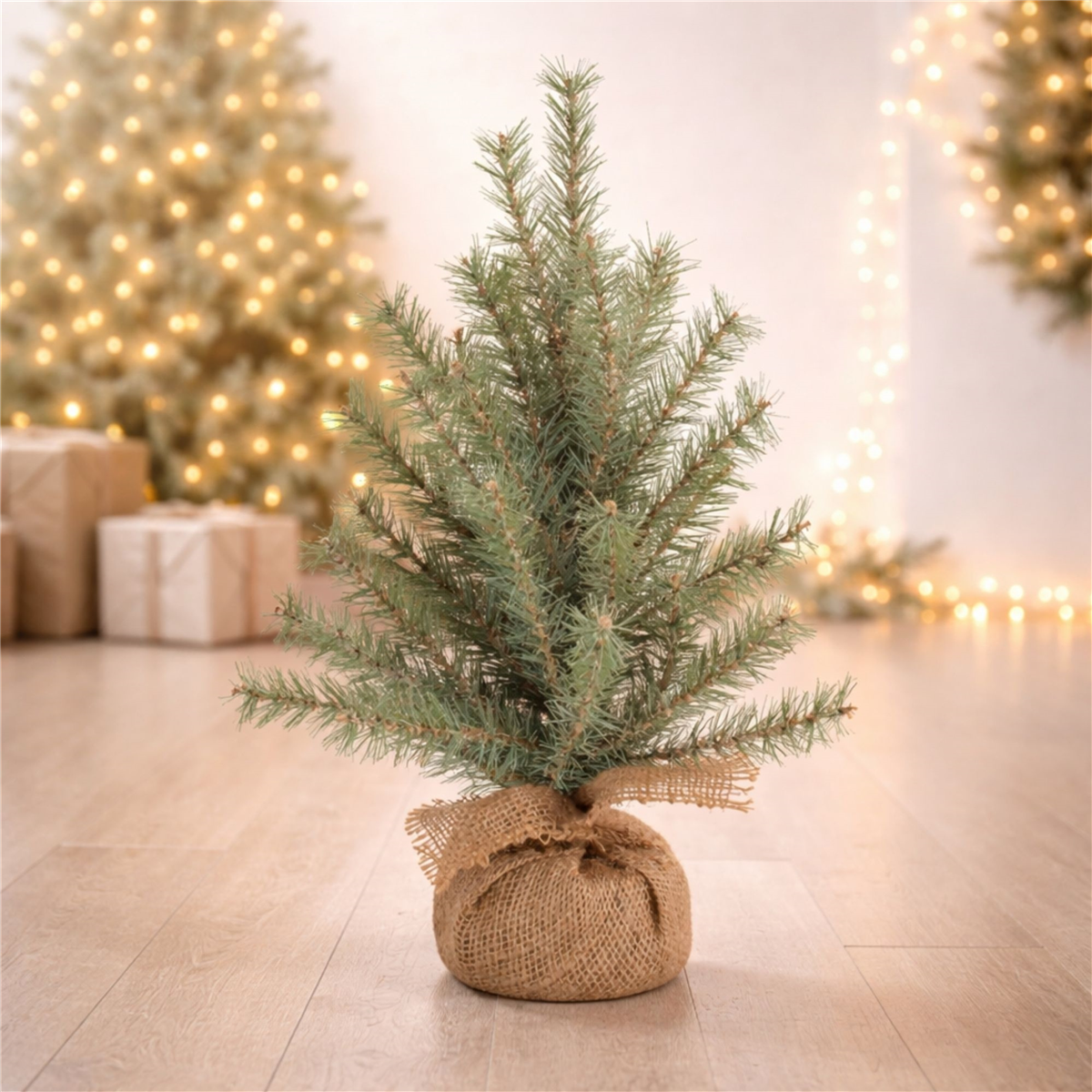 Melrose 1.5ft. Glittered Pine Tree in Burlap
