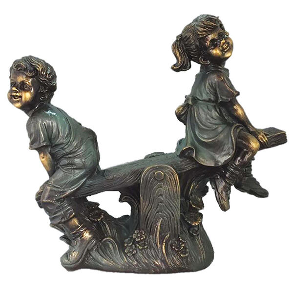 Santa's Workshop 17.5in. Boy & Girl on Teeter Totter Statue - image 
