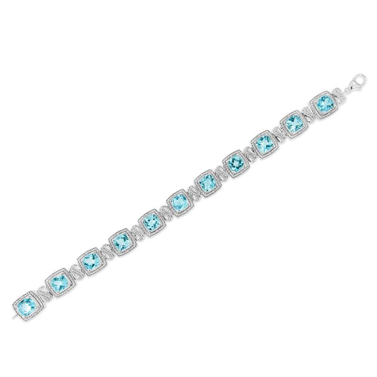 Haus of Brilliance Blue Topaz & 1/10ctw. Diamond Tennis Bracelet