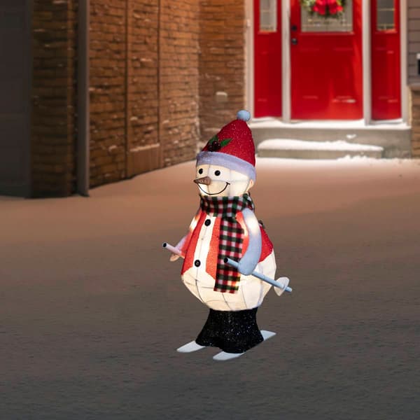Northlight Seasonal 24in. LED Animated Skiing Snowman Figurine
