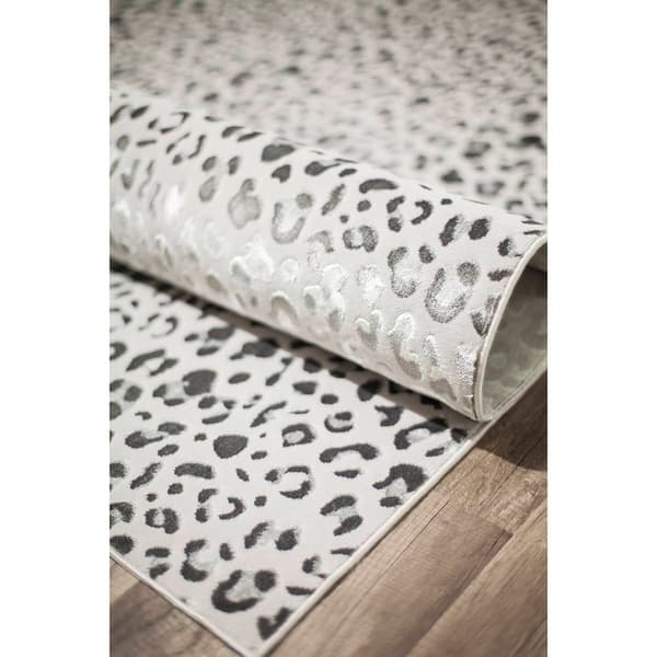 CosmoLiving by Cosmopolitan™ Hazel Snow Leopard Area Rug