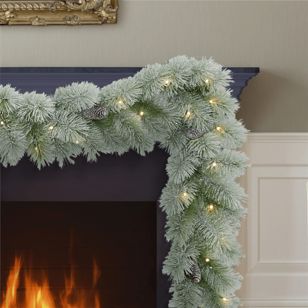 Puleo International 9ft. Pre-Lit Warm White Flocked Garland