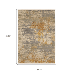 HomeRoots Modern Beige & Gold Abstract Area Rug with Fringe