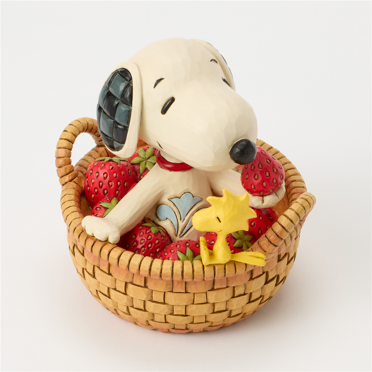 Jim Shore Peanuts™ Snoopy in Strawberry Basket Figurine