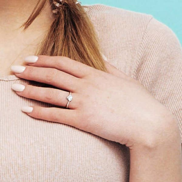 Sterling Silver Sky Blue Topaz & Diamond Accent Heart Ring