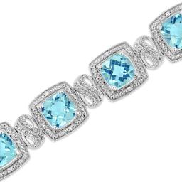 Haus of Brilliance Blue Topaz & 1/10ctw. Diamond Tennis Bracelet