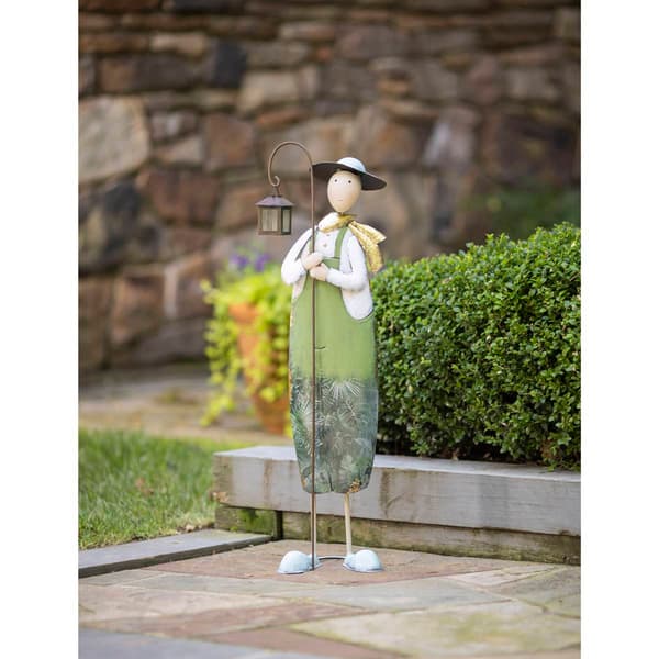 Evergreen Metal Farmer with Lantern Statuary - image 