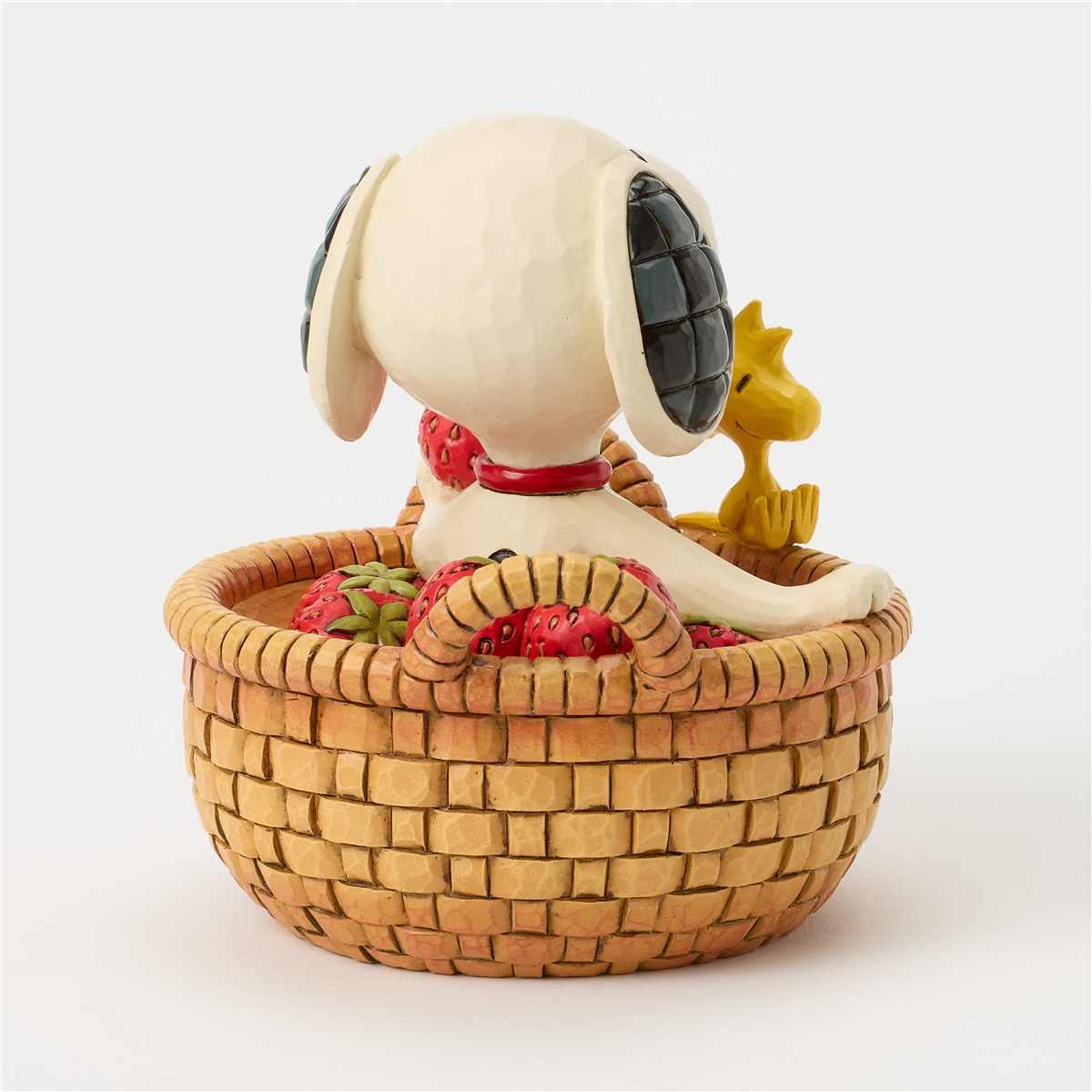 Jim Shore Peanuts™ Snoopy in Strawberry Basket Figurine