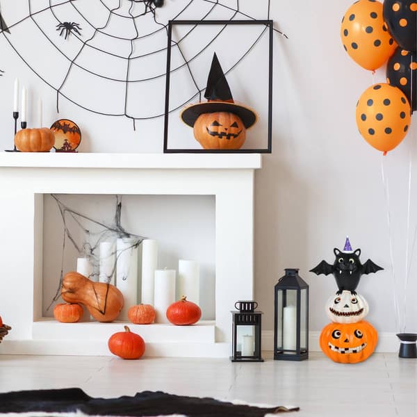 National Tree 22in. Pre-Lit Bat Standing on Pumpkins Décor