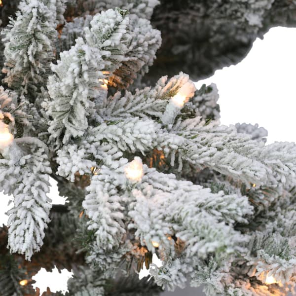 Puleo International 6.5ft. Pre-Lit Flocked Fir Christmas Tree