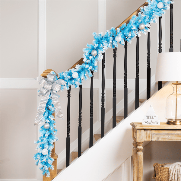 Northlight 9ft. Sky Blue Flocked Pine Christmas Garland
