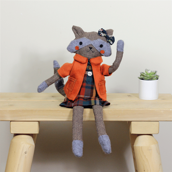 Northlight Sitting Herringbone Designed Fox Girl with Plaid Dress