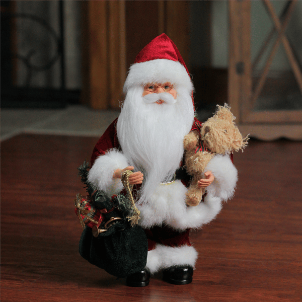 Northlight 12in. Santa Claus Holding Gift Bag Christmas Figure