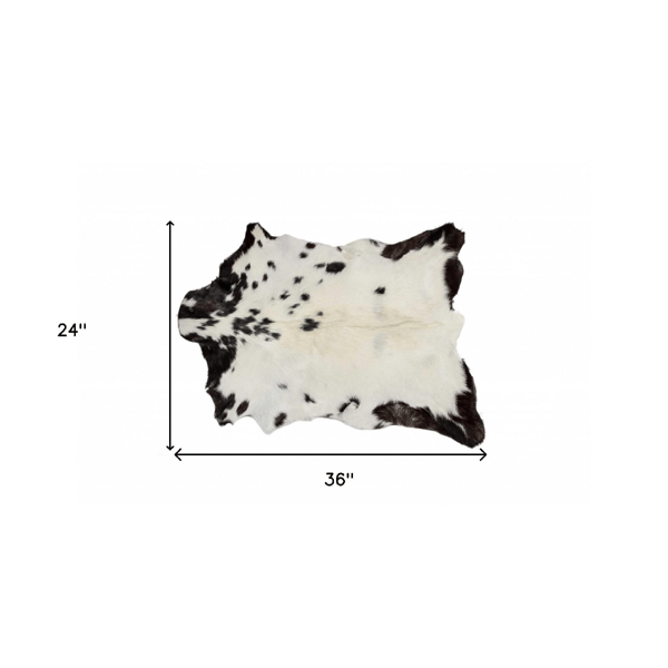 HomeRoots Black & White Cowhide Cowhide Print Hand Woven Accent