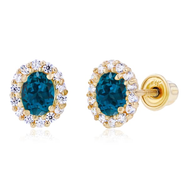 Gemstone Classics(tm) Yellow Gold Blue Topaz Oval Earrings - image 
