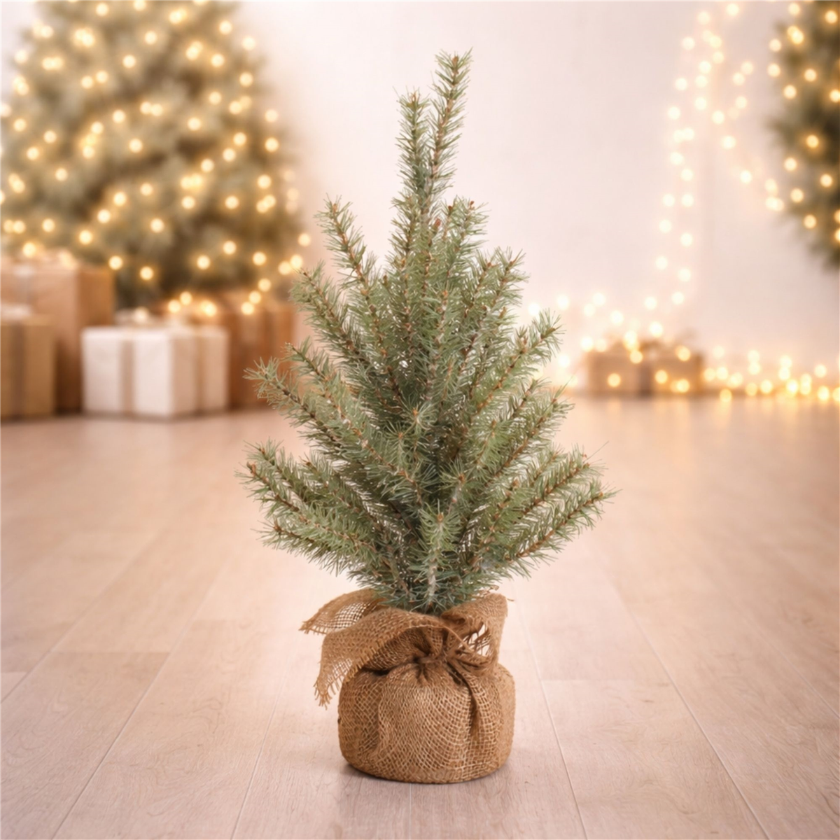 Melrose 2ft. Glittered Pine Tree in Burlap
