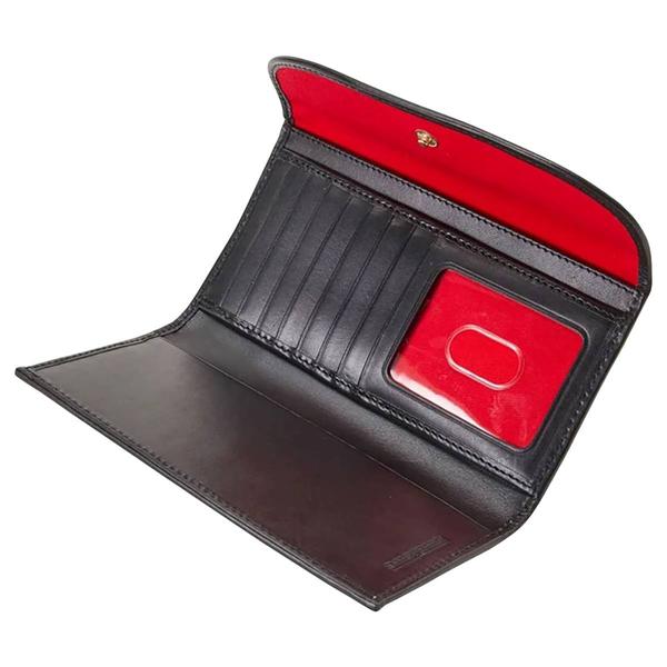 Dooney & Bourke Tucker Continental Clutch