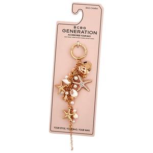 Womens BCBG Starfish Shell Bag Charm