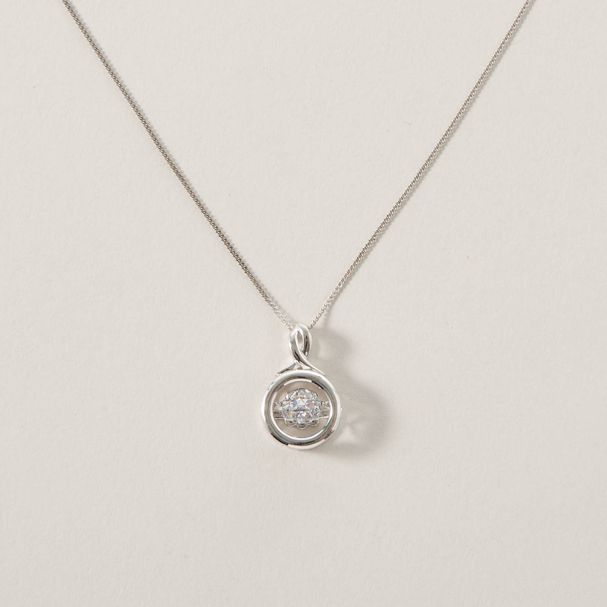 Rhodium Plated Dancing CZ Round Pendant Necklace