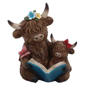 Highland Cow Reading to Her Baby