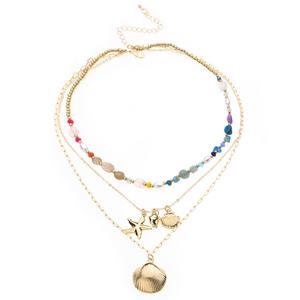 Ashley Cooper(tm) Layered Beaded Sea Life Charm Cluster Necklace